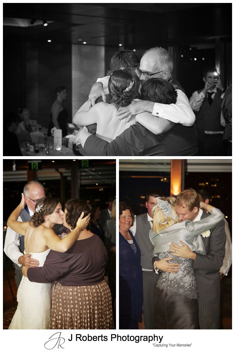 Family hugs during wedding reception - sydney wedding photography 